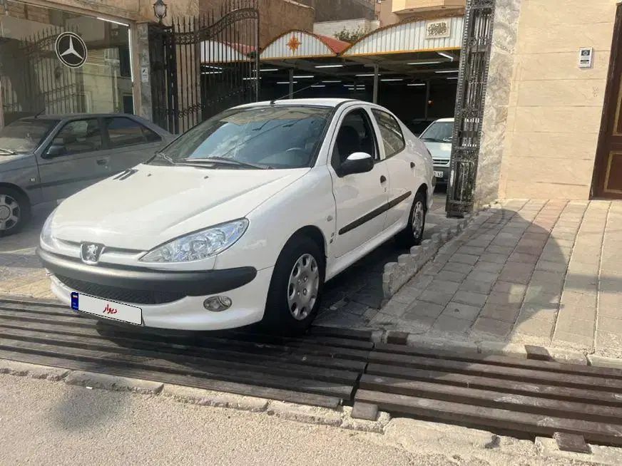 پژو ۲۰۶ صندوق دار v8 - 1395