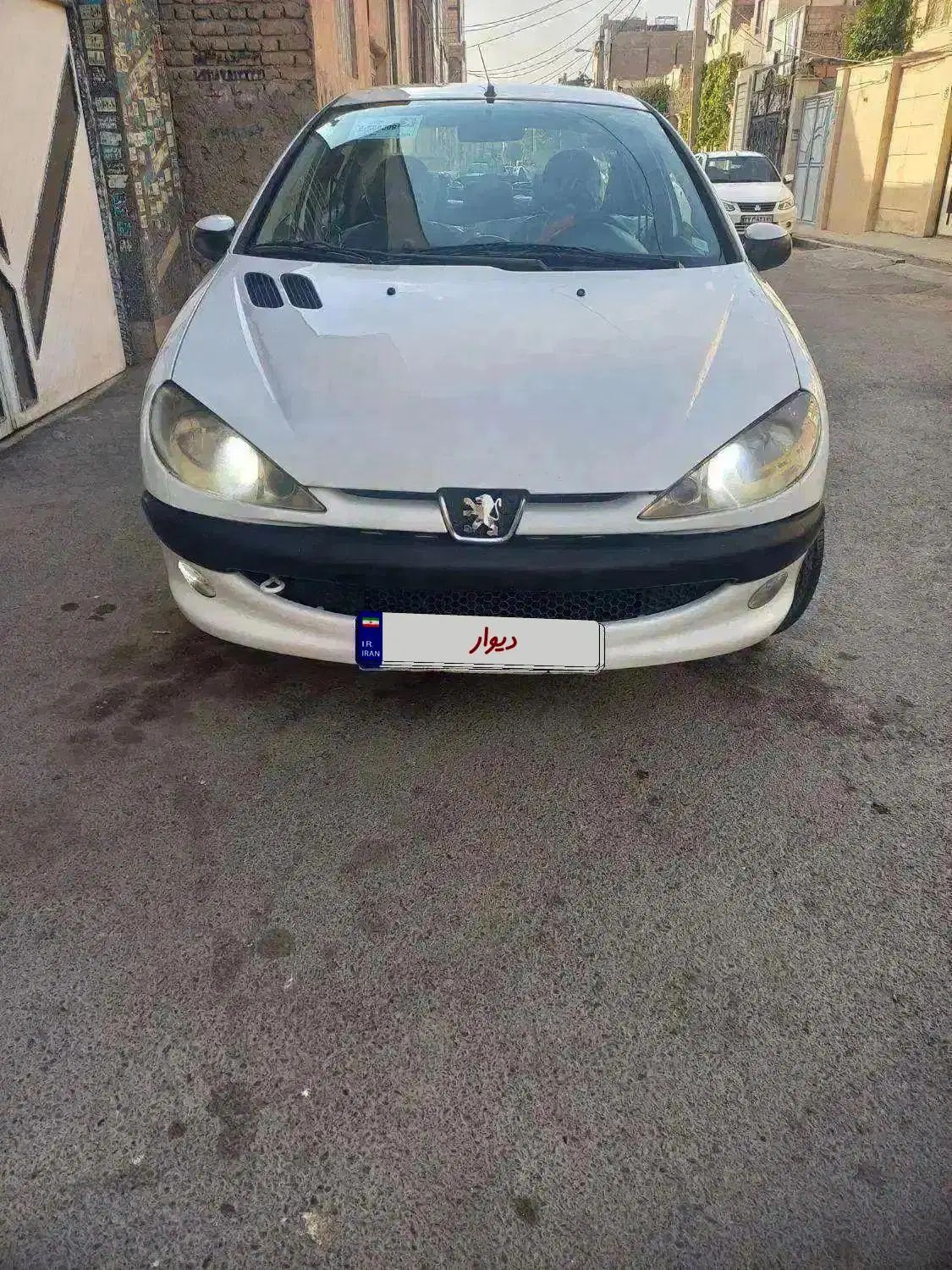 پژو ۲۰۶ صندوق دار v8 - 1394
