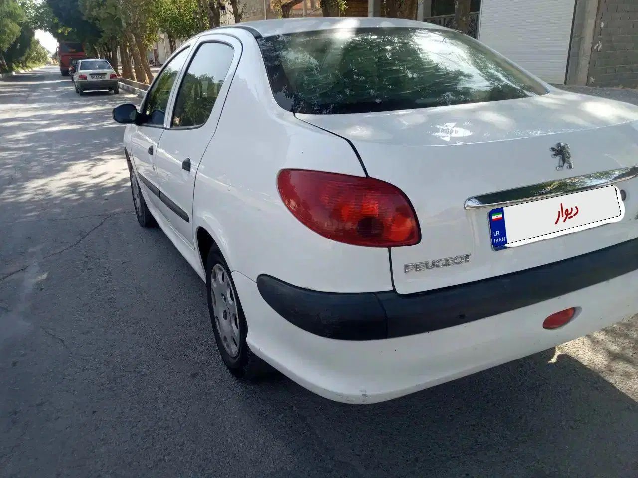 پژو ۲۰۶ صندوق دار v8 - 1397