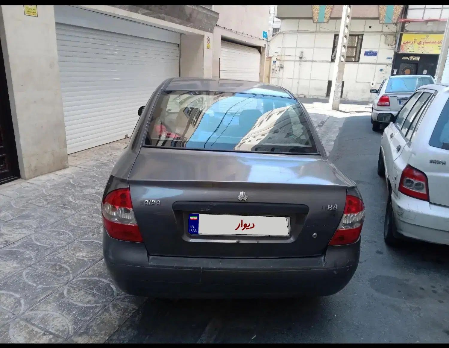تیبا صندوق دار SX - 1392