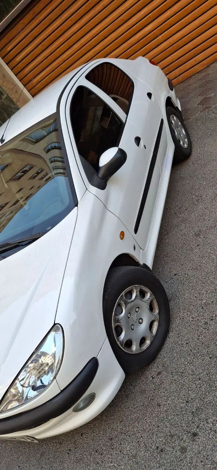 پژو ۲۰۶ صندوق دار v8 - 1395