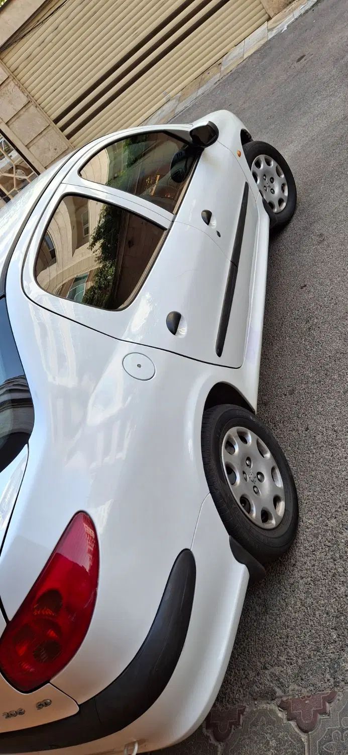پژو ۲۰۶ صندوق دار v8 - 1395