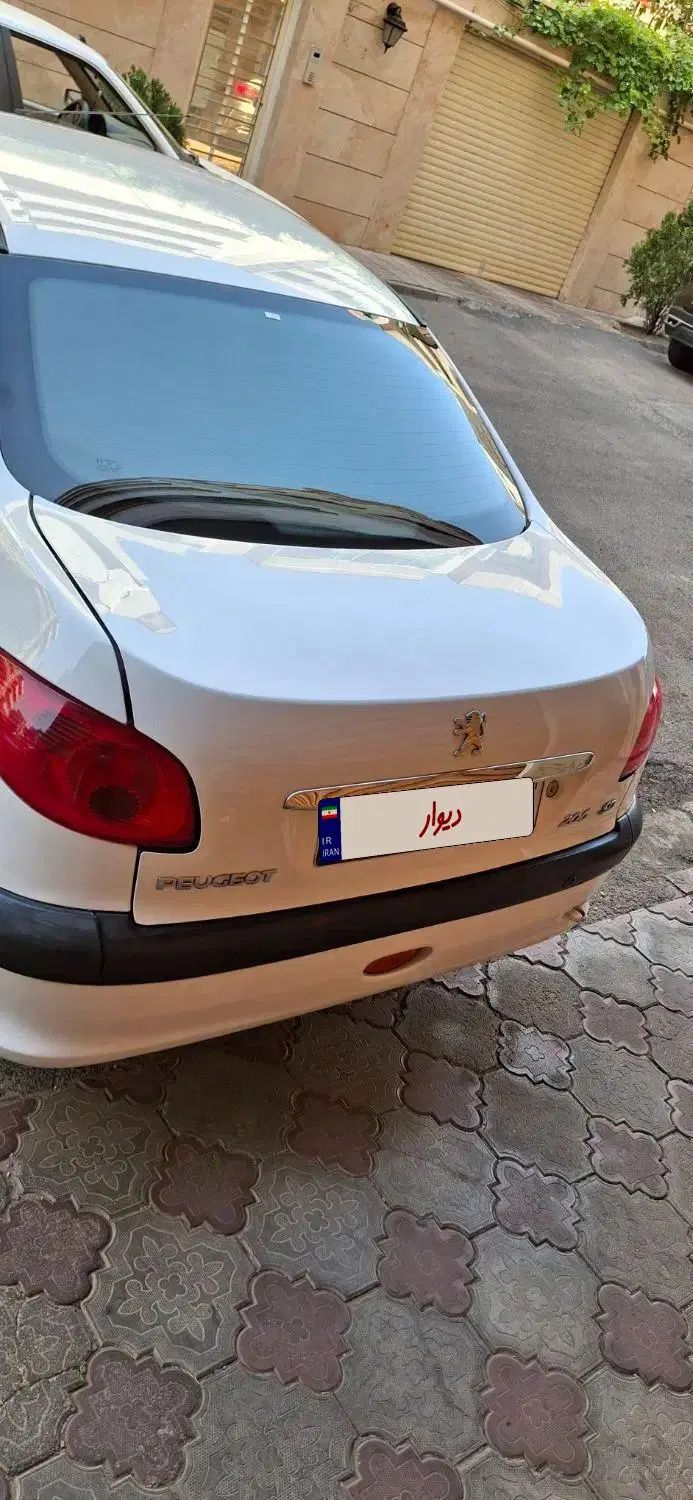 پژو ۲۰۶ صندوق دار v8 - 1395