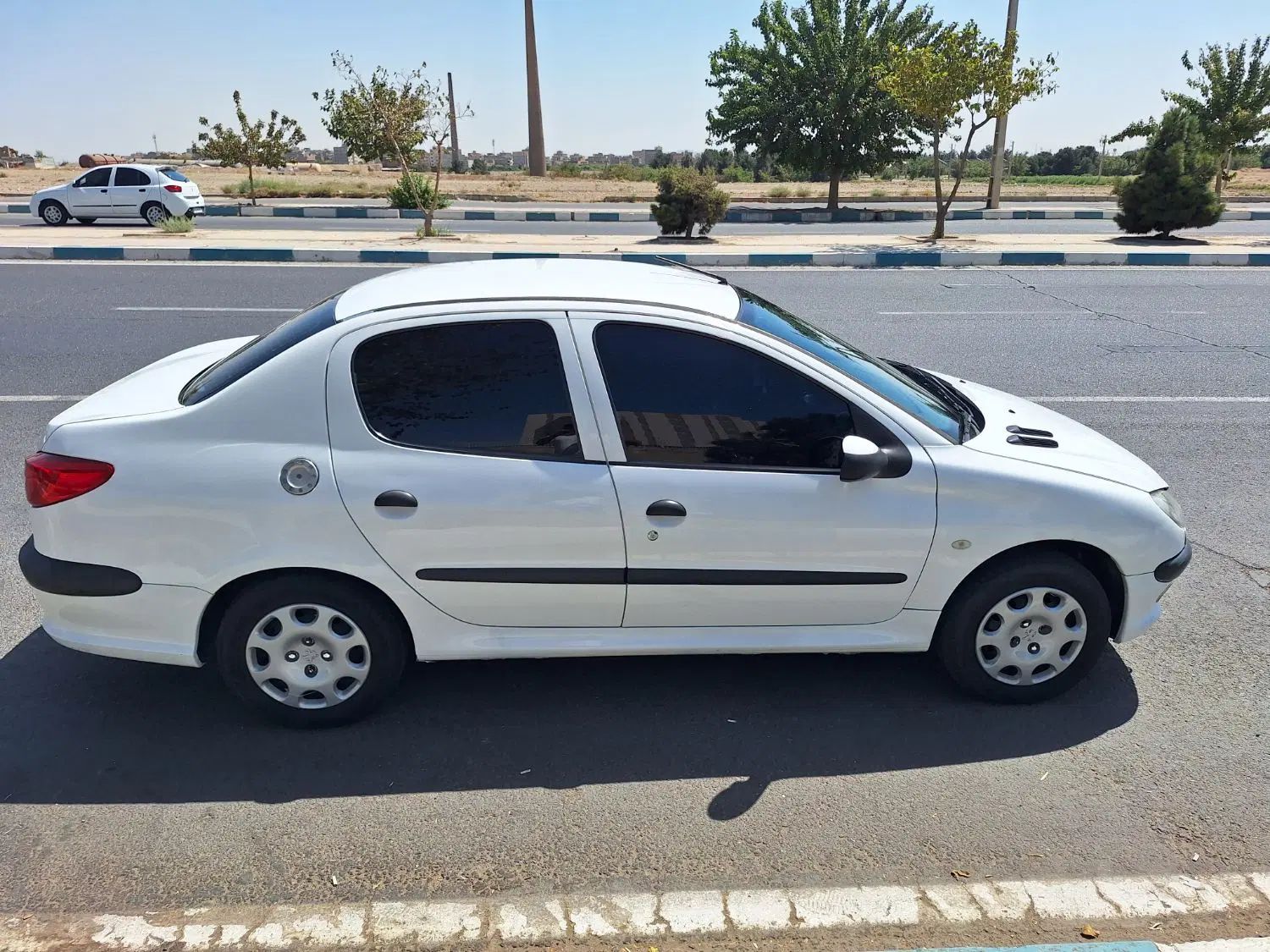 پژو ۲۰۶ صندوق دار v8 - 1396