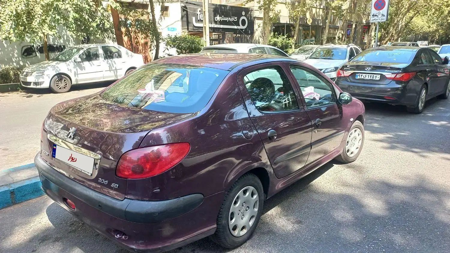 پژو ۲۰۶ صندوق دار v8 - 1396