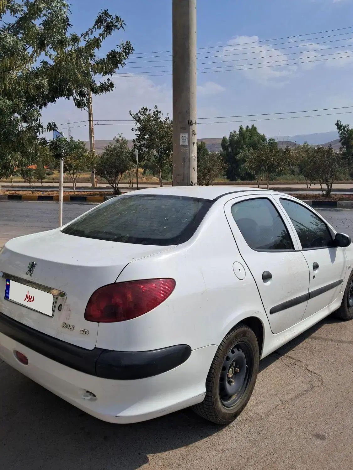 پژو ۲۰۶ صندوق دار v8 - 1399