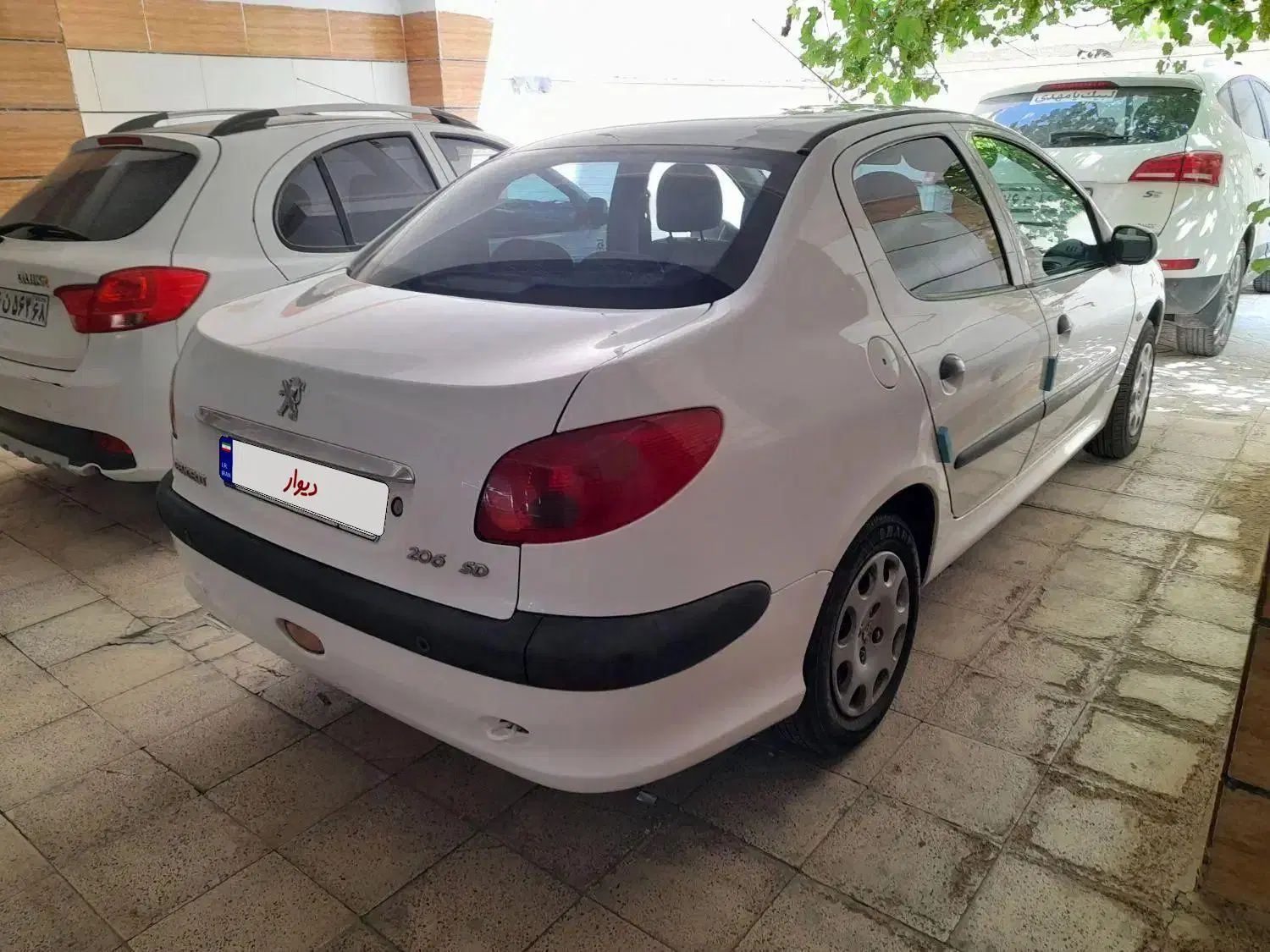 پژو ۲۰۶ صندوق دار v8 - 1396