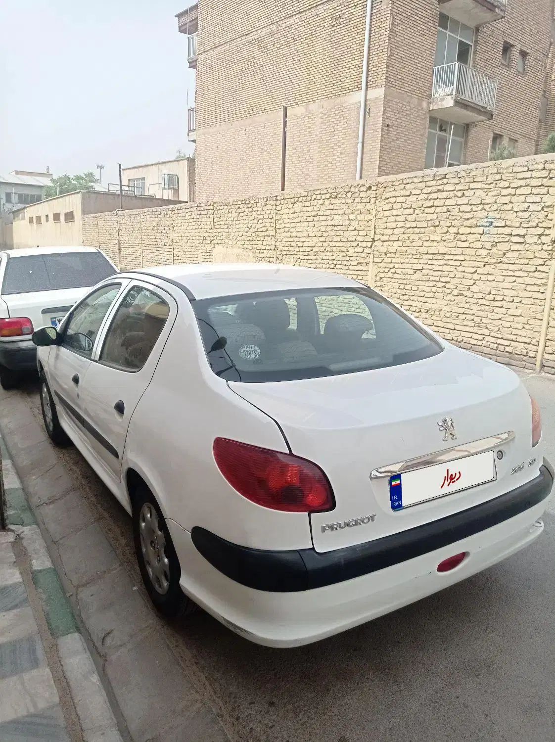 پژو ۲۰۶ صندوق دار v8 - 1397