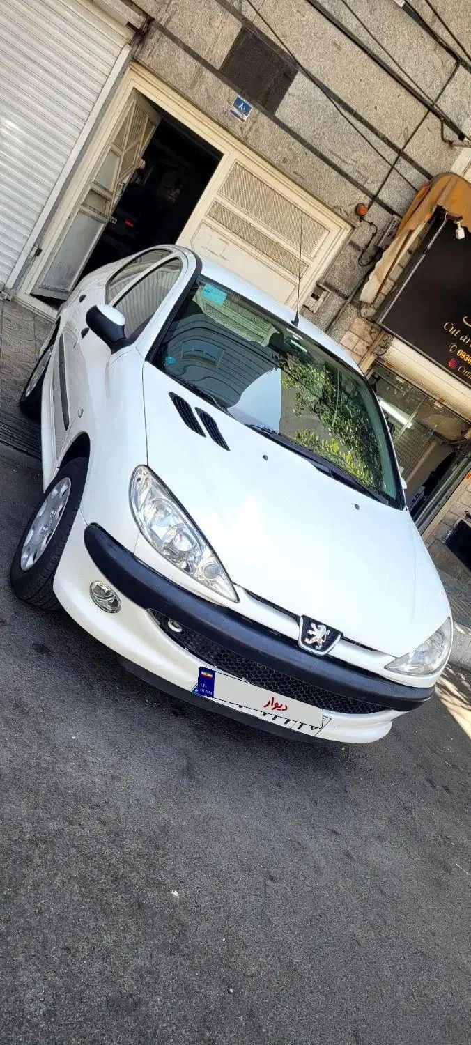 پژو ۲۰۶ صندوق دار v8 - 1396