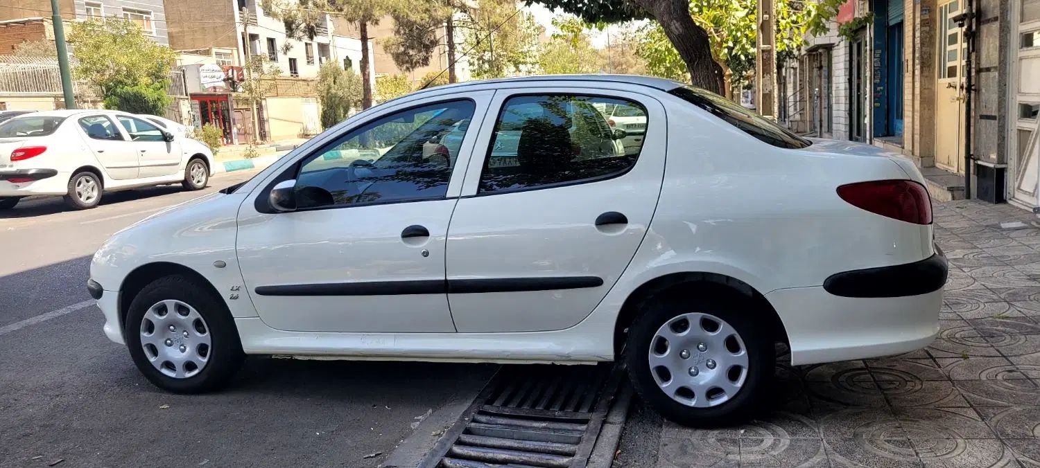 پژو ۲۰۶ صندوق دار v8 - 1396