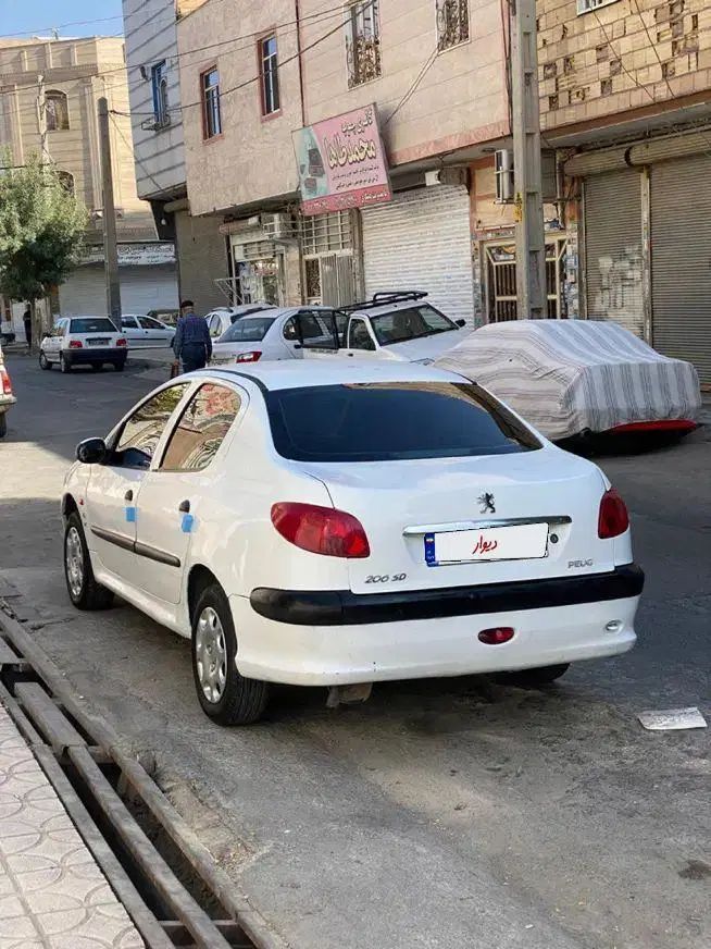 پژو ۲۰۶ صندوق دار v20 - 1389