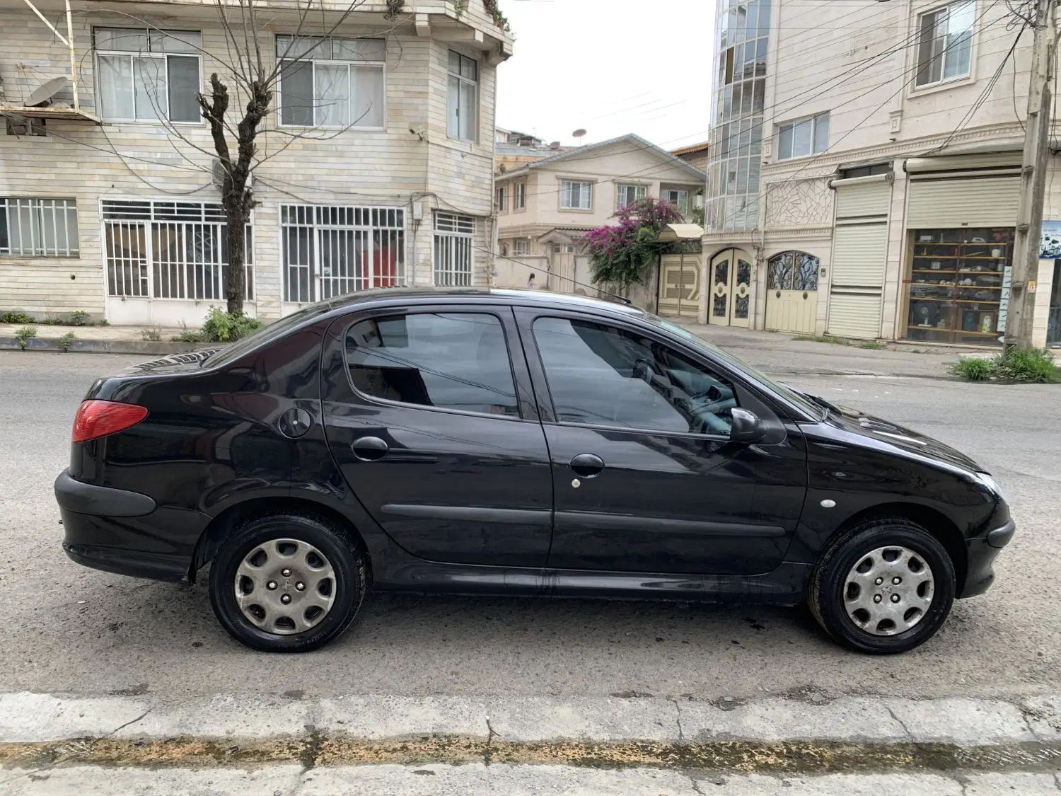 پژو ۲۰۶ صندوق دار v8 - 1396