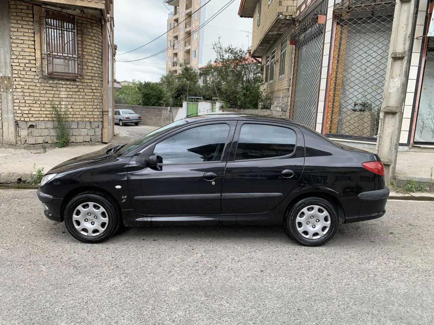 پژو ۲۰۶ صندوق دار v8 - 1396