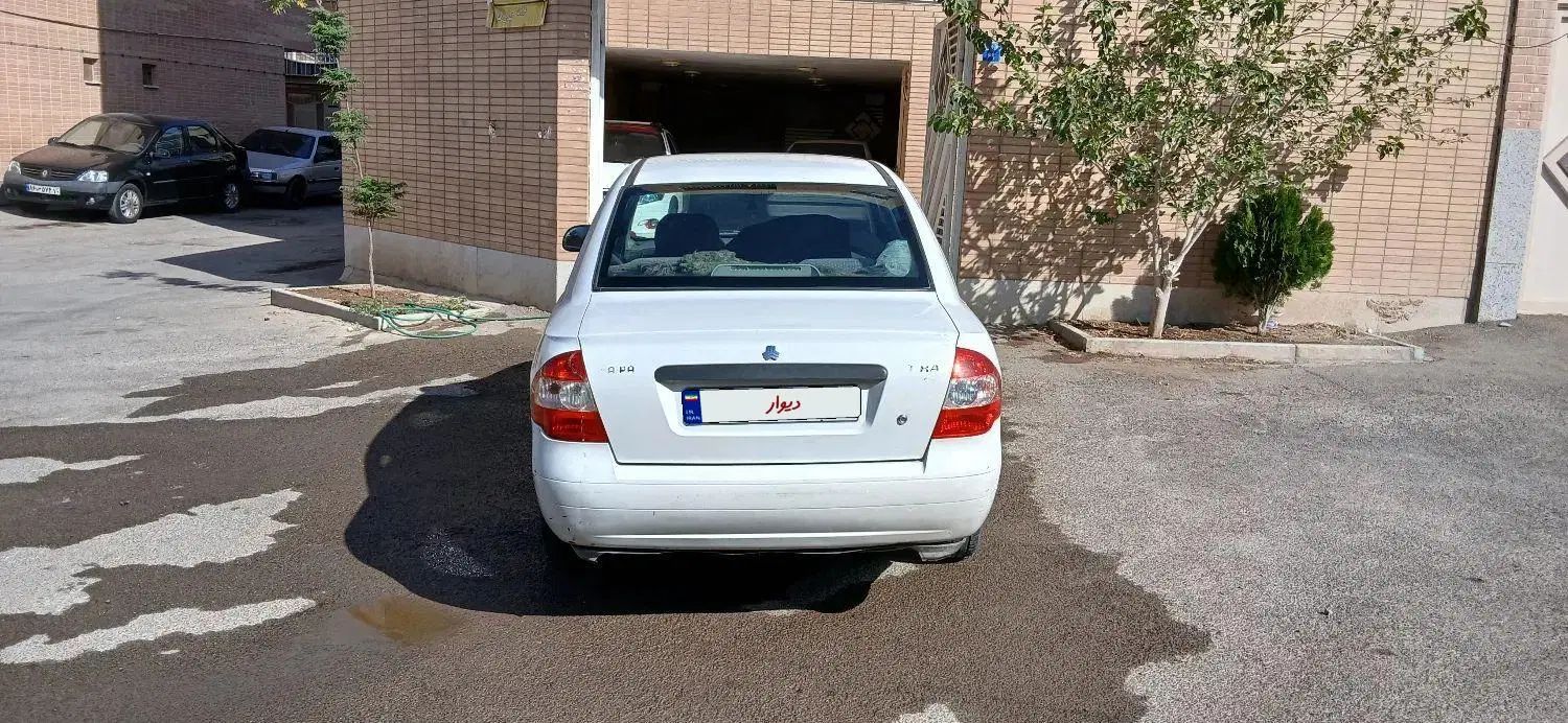 تیبا صندوق دار SX - 1392