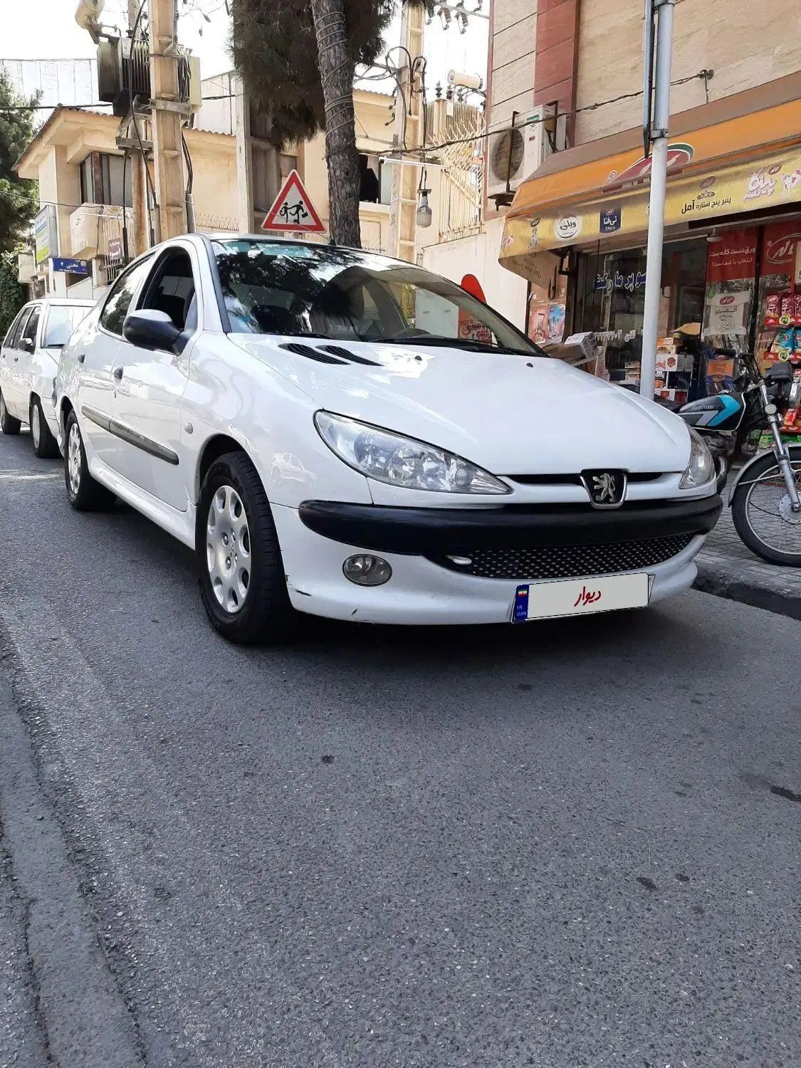 پژو ۲۰۶ صندوق دار v8 - 1396