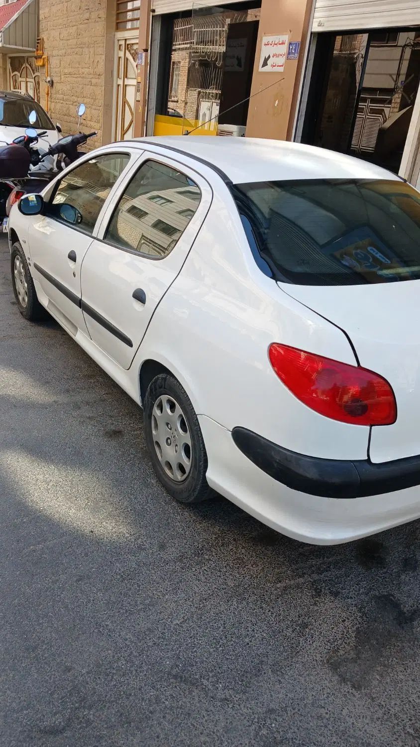 پژو ۲۰۶ صندوق دار v8 - 1391
