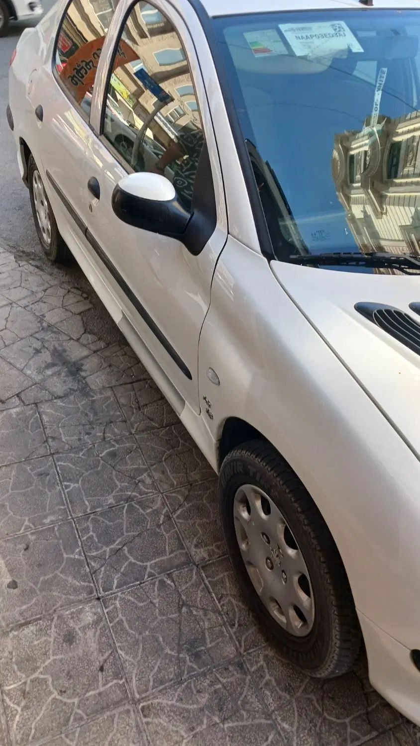 پژو ۲۰۶ صندوق دار v8 - 1391
