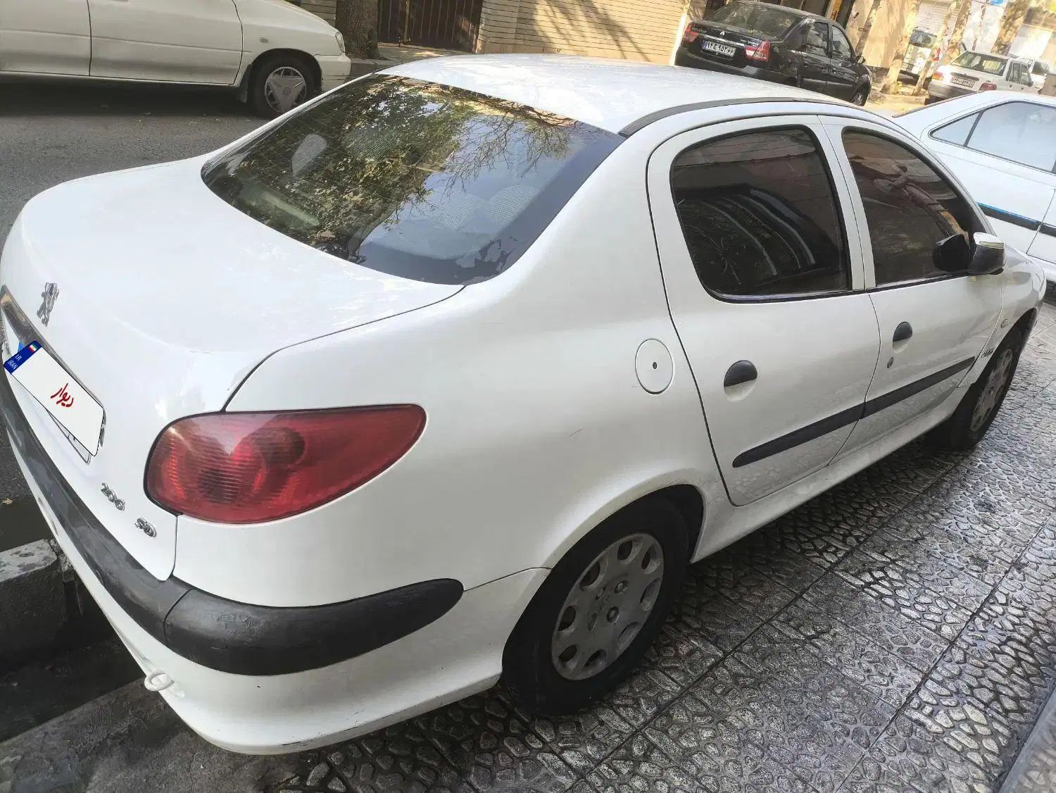 پژو ۲۰۶ صندوق دار v8 - 1396