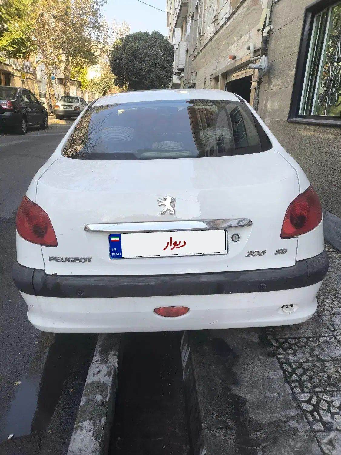 پژو ۲۰۶ صندوق دار v8 - 1396