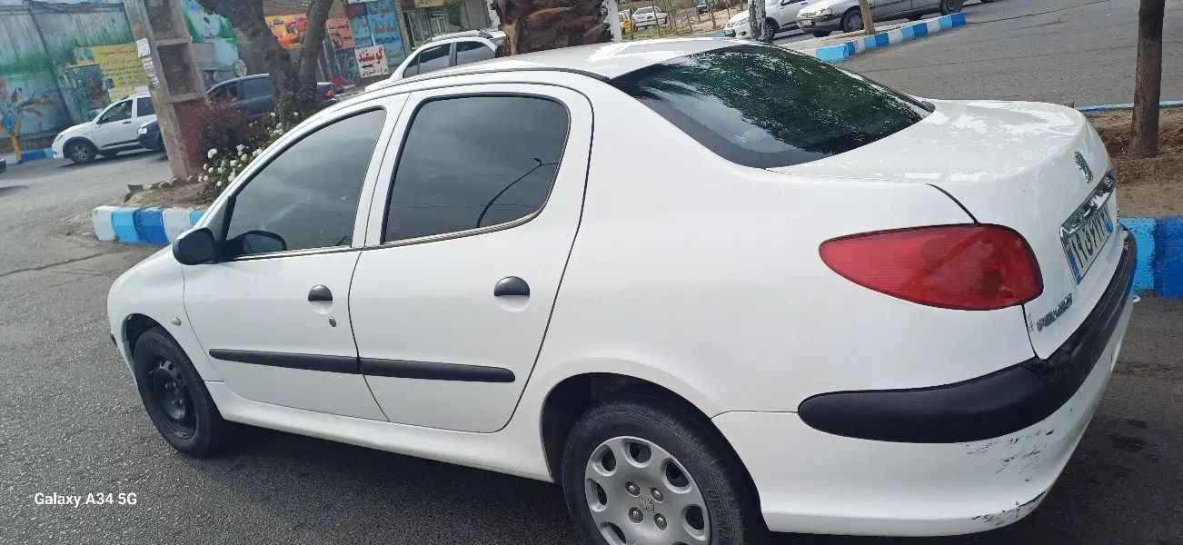 پژو ۲۰۶ صندوق دار v8 - 1395
