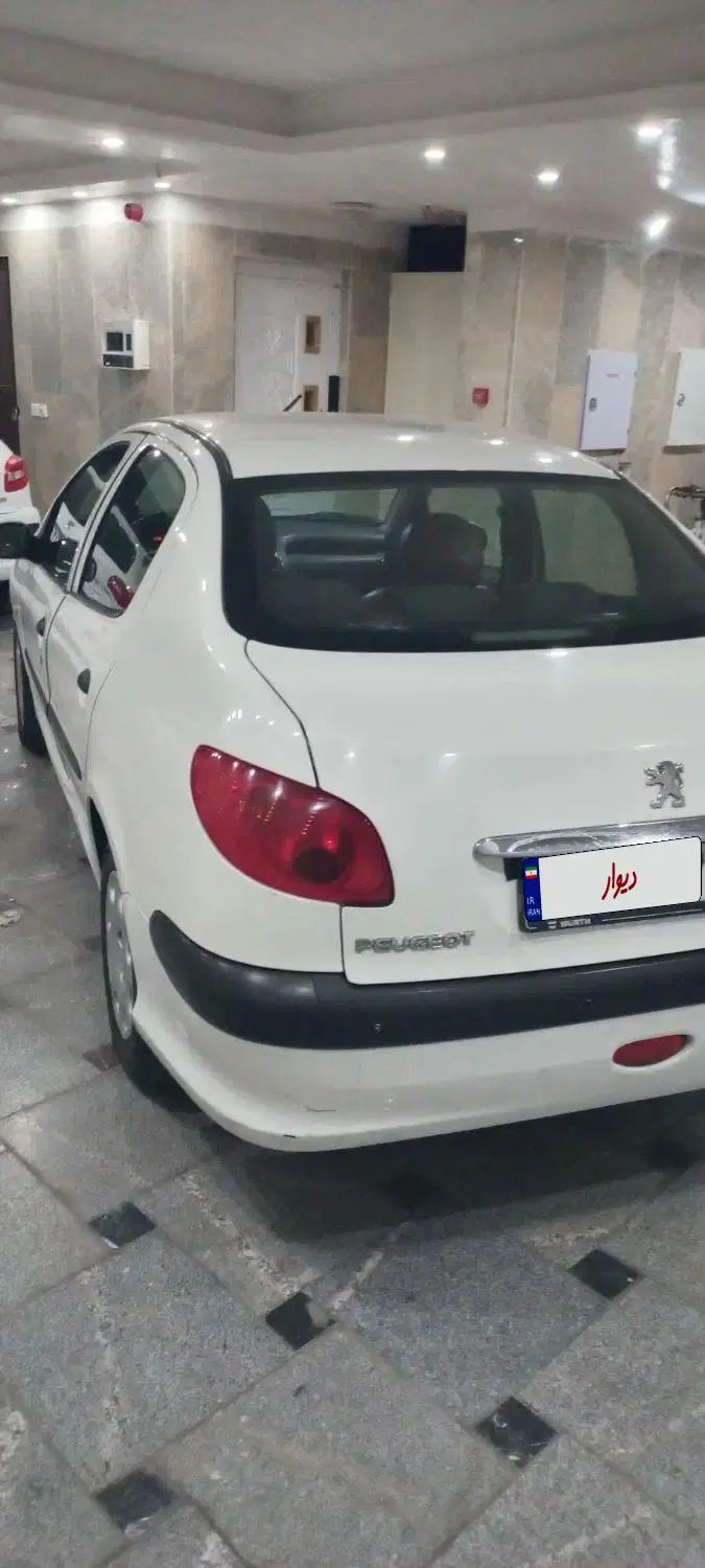 پژو ۲۰۶ صندوق دار v8 - 1392