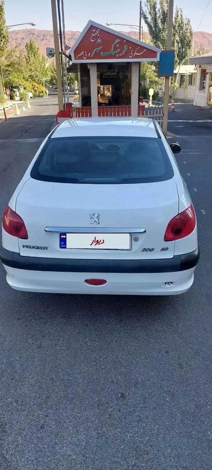 پژو ۲۰۶ صندوق دار v8 - 1395