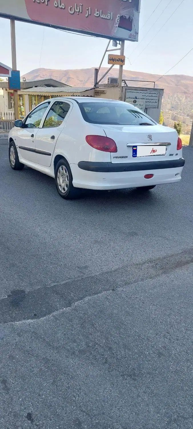 پژو ۲۰۶ صندوق دار v8 - 1395