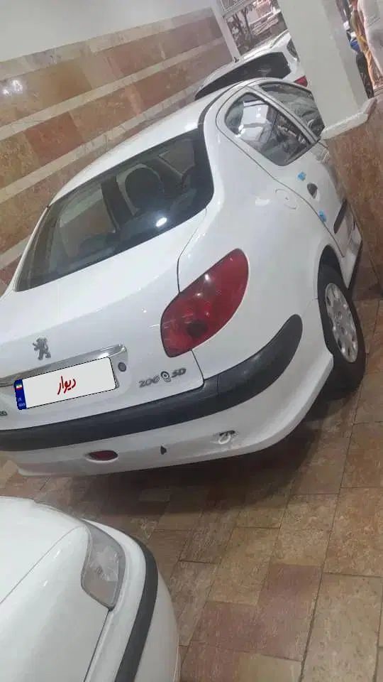 پژو ۲۰۶ صندوق دار v8 - 1394
