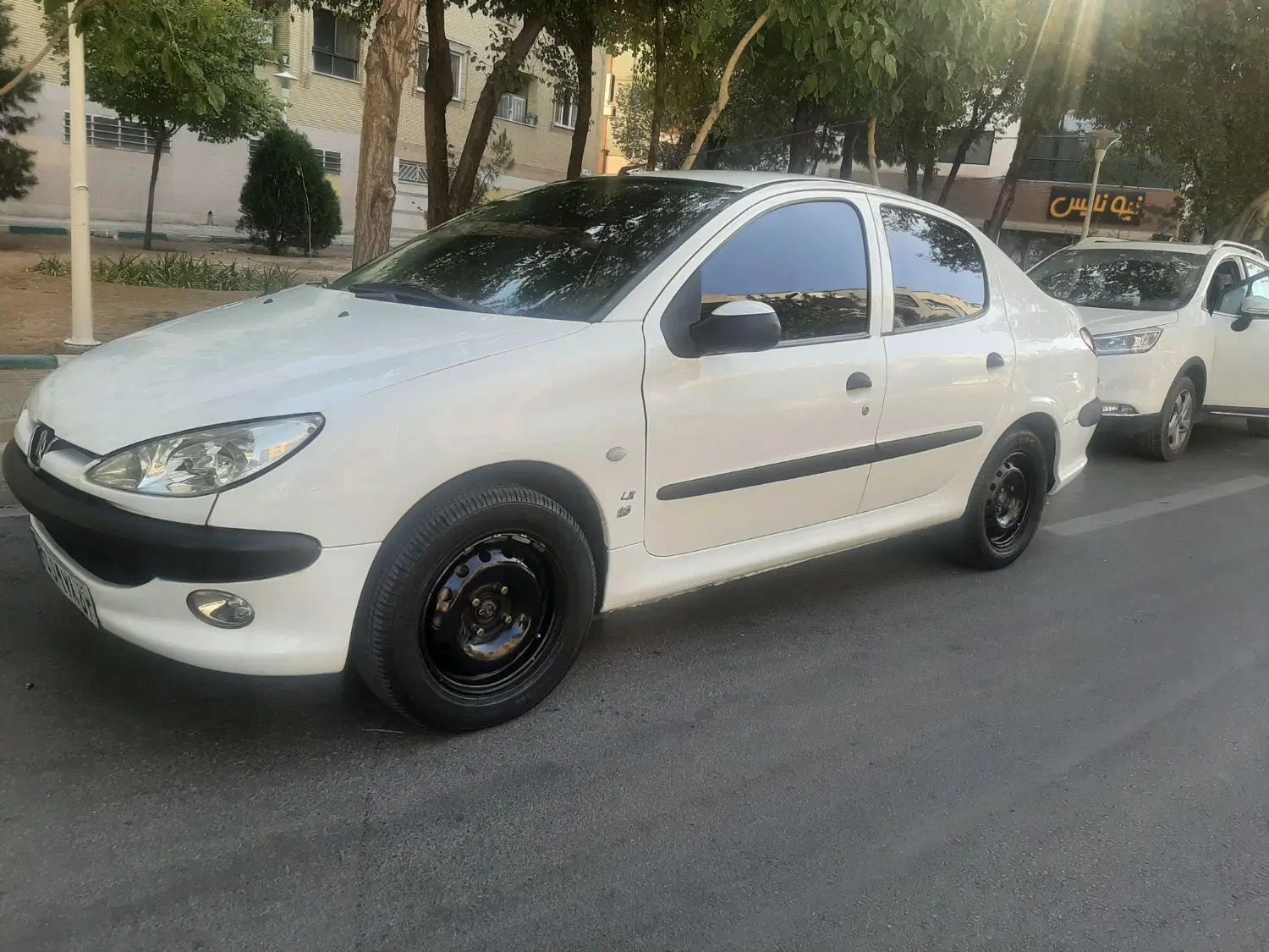 پژو ۲۰۶ صندوق دار v8 - 1393