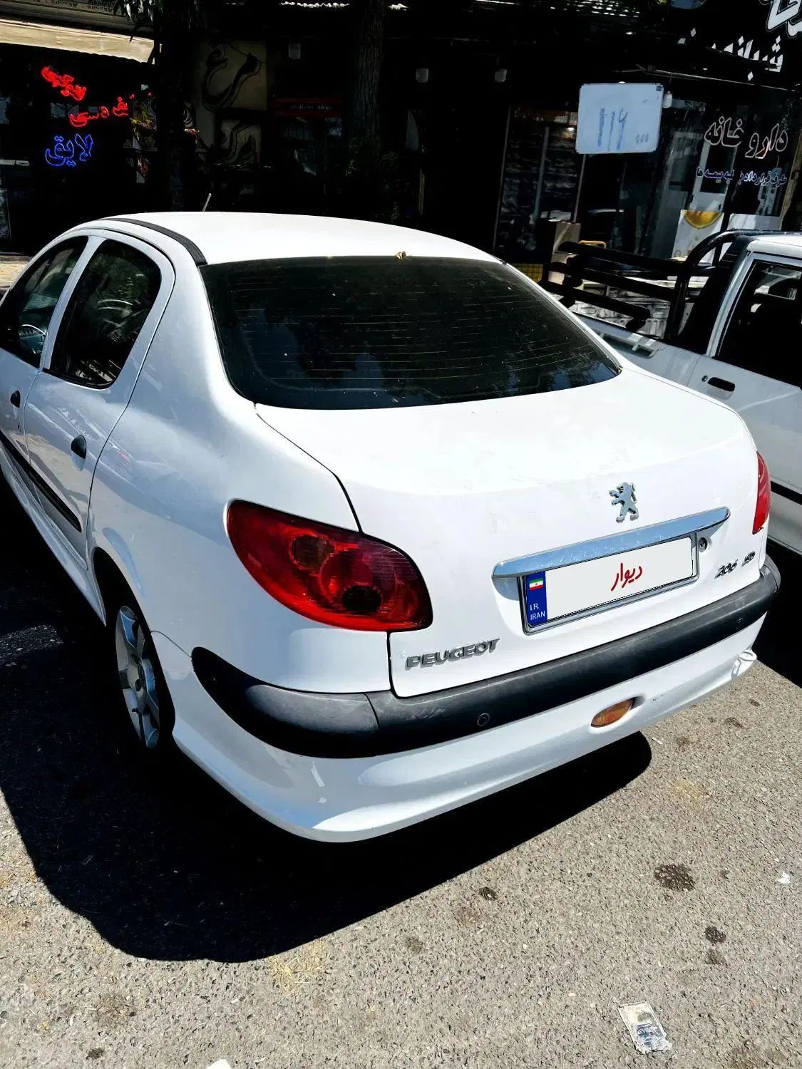 پژو ۲۰۶ صندوق دار v8 - 1395