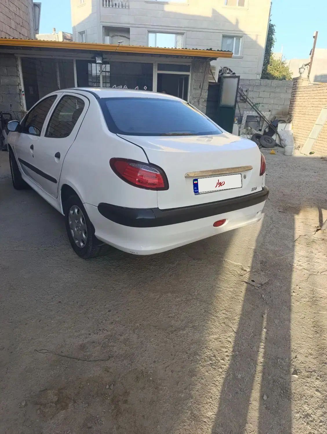 پژو ۲۰۶ صندوق دار v8 - 1391