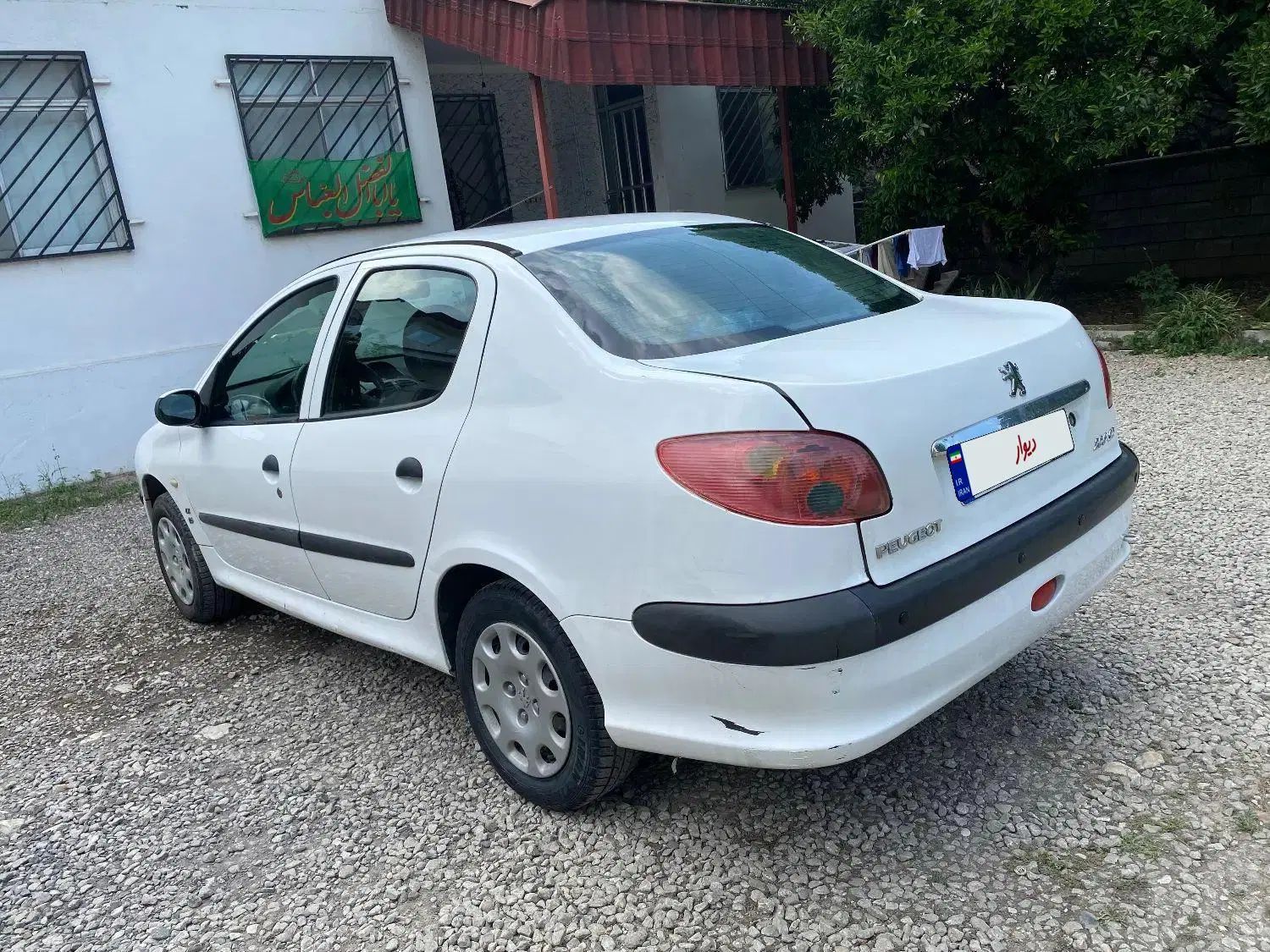 پژو ۲۰۶ صندوق دار v8 - 1391
