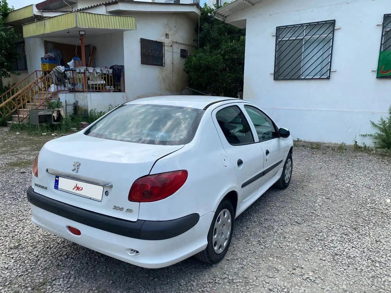 پژو ۲۰۶ صندوق دار v8 - 1391