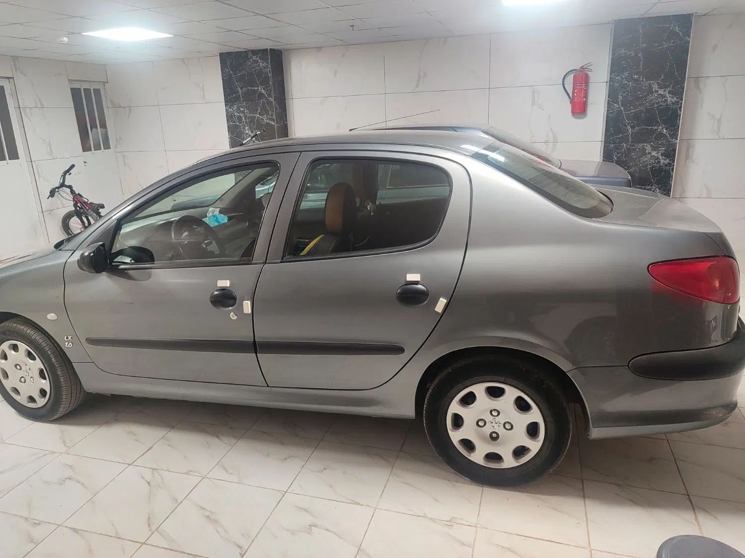 پژو ۲۰۶ صندوق دار v8 - 1395