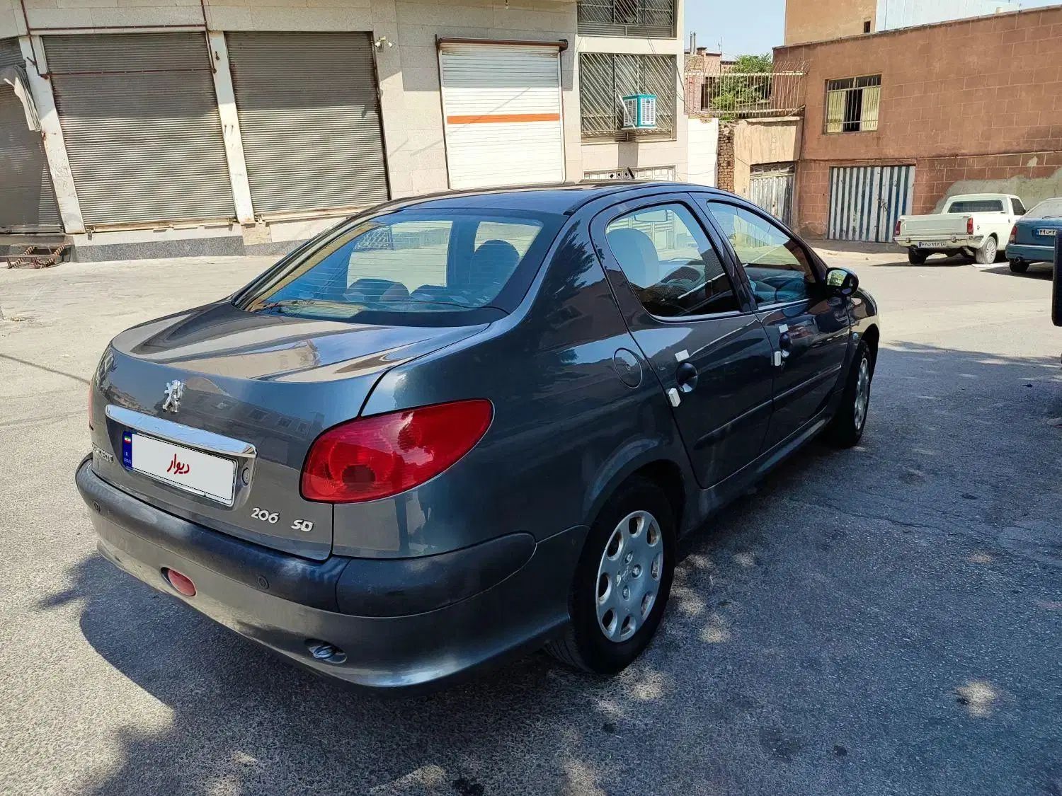 پژو ۲۰۶ صندوق دار v8 - 1395