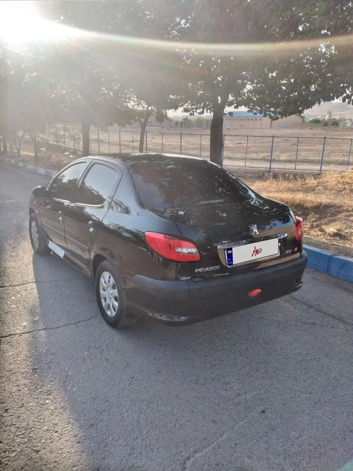 پژو ۲۰۶ صندوق دار v8 - 1398