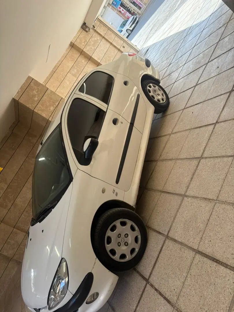 پژو ۲۰۶ صندوق دار v8 - 1395