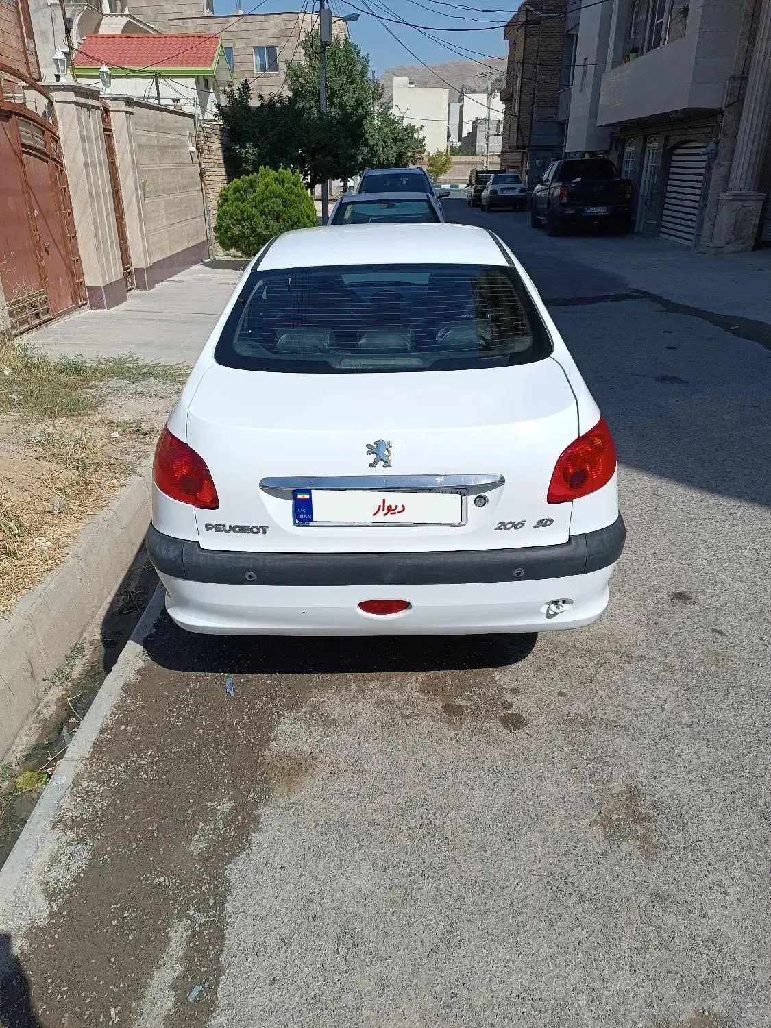 پژو ۲۰۶ صندوق دار v8 - 1396