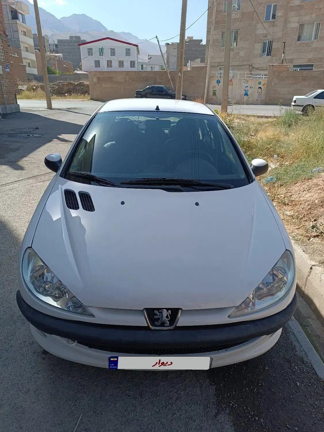 پژو ۲۰۶ صندوق دار v8 - 1396
