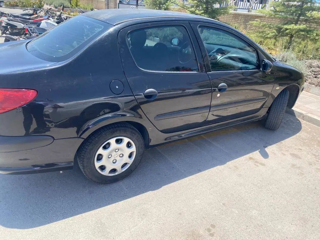 پژو ۲۰۶ صندوق دار v8 - 1391