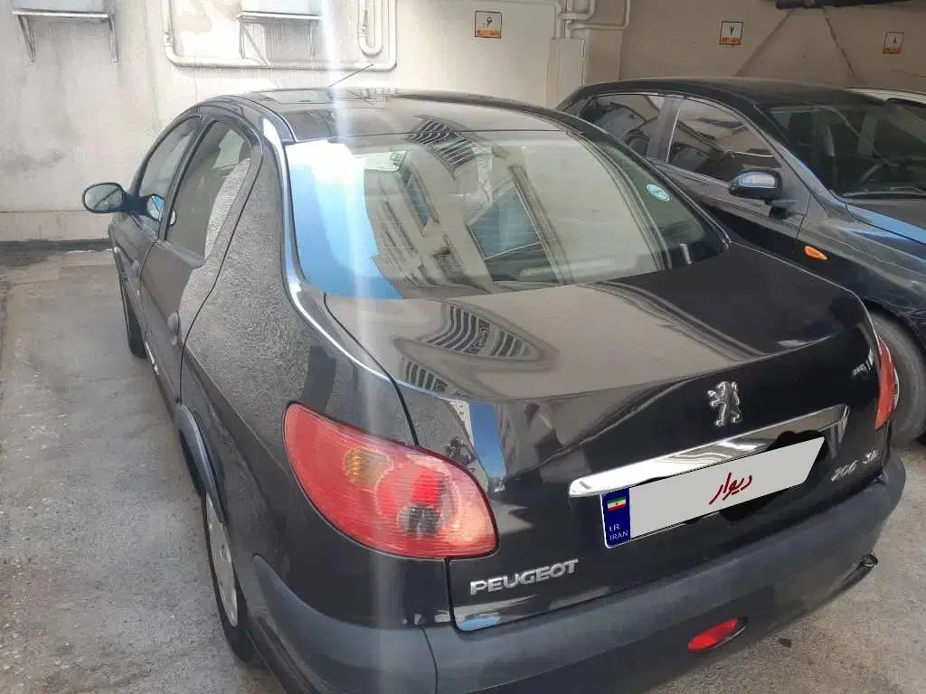 پژو ۲۰۶ صندوق دار v8 - 1394
