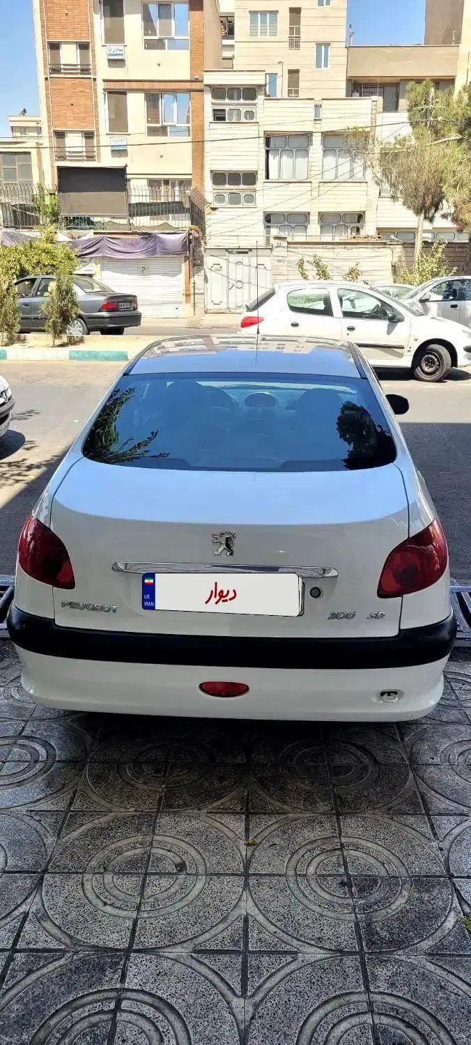پژو ۲۰۶ صندوق دار v8 - 1396