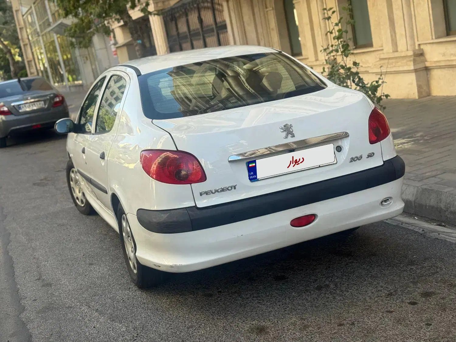 پژو ۲۰۶ صندوق دار v8 - 1395