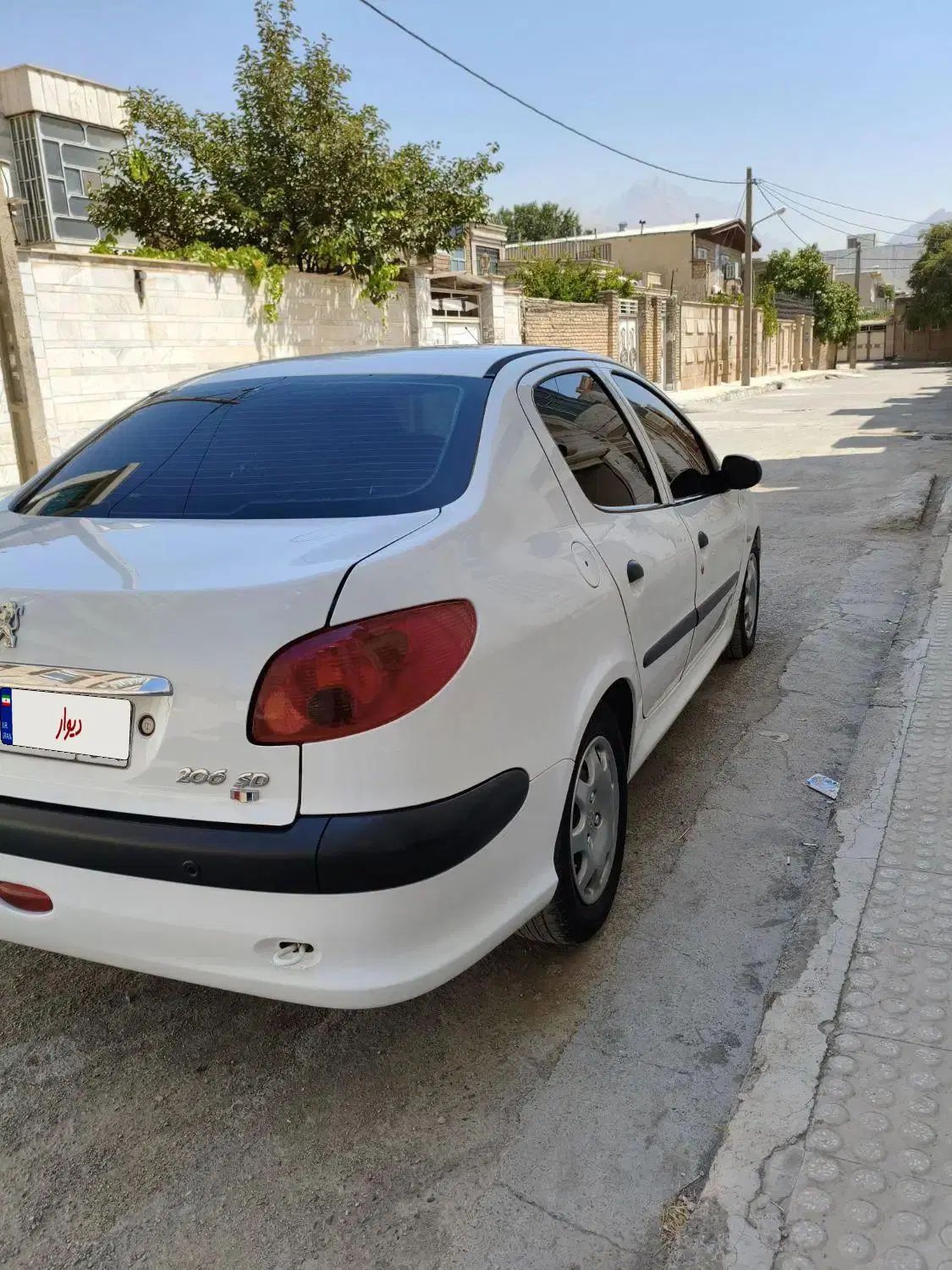 پژو ۲۰۶ صندوق دار v8 - 1395