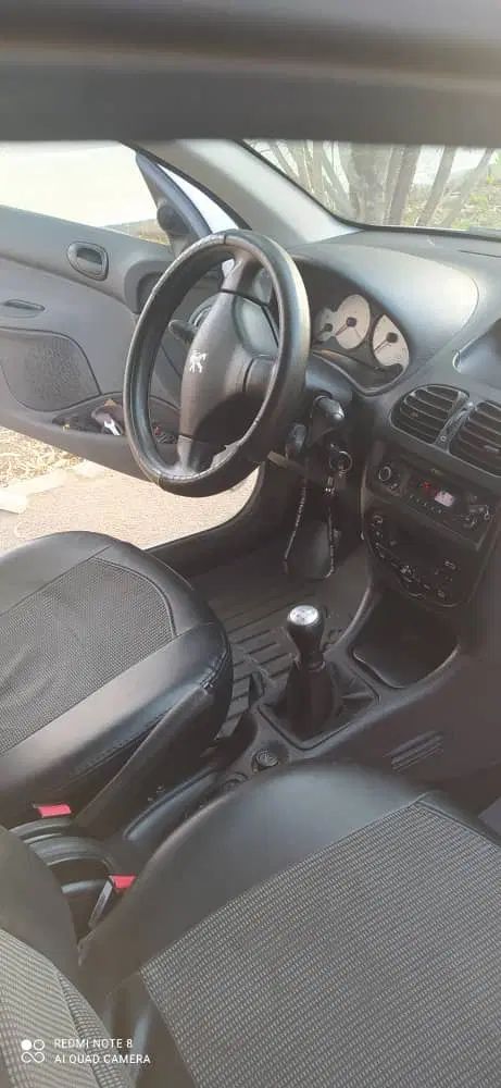 پژو ۲۰۶ صندوق دار v8 - 1396