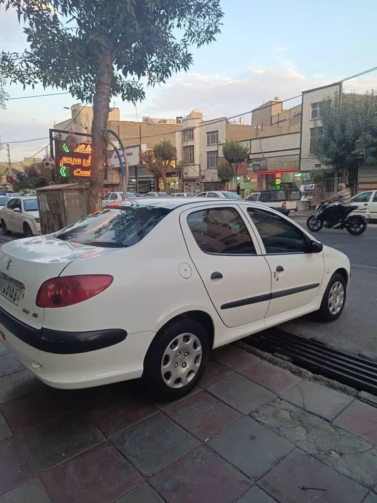 پژو ۲۰۶ صندوق دار v8 - 1396