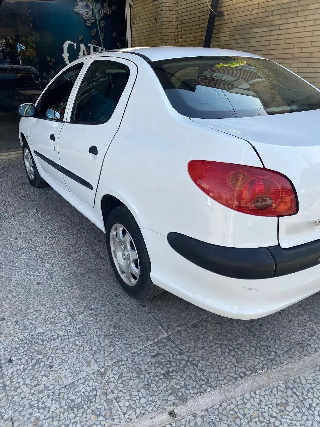 پژو ۲۰۶ صندوق دار v8 - 1394