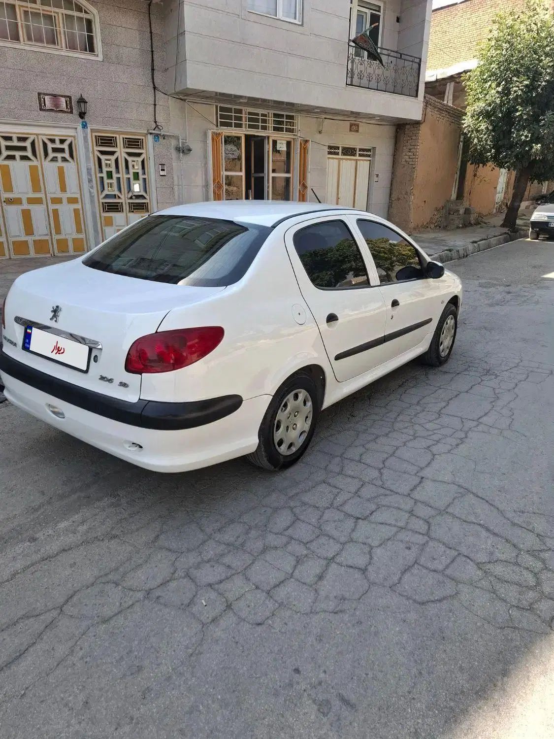 پژو ۲۰۶ صندوق دار v8 - 1396