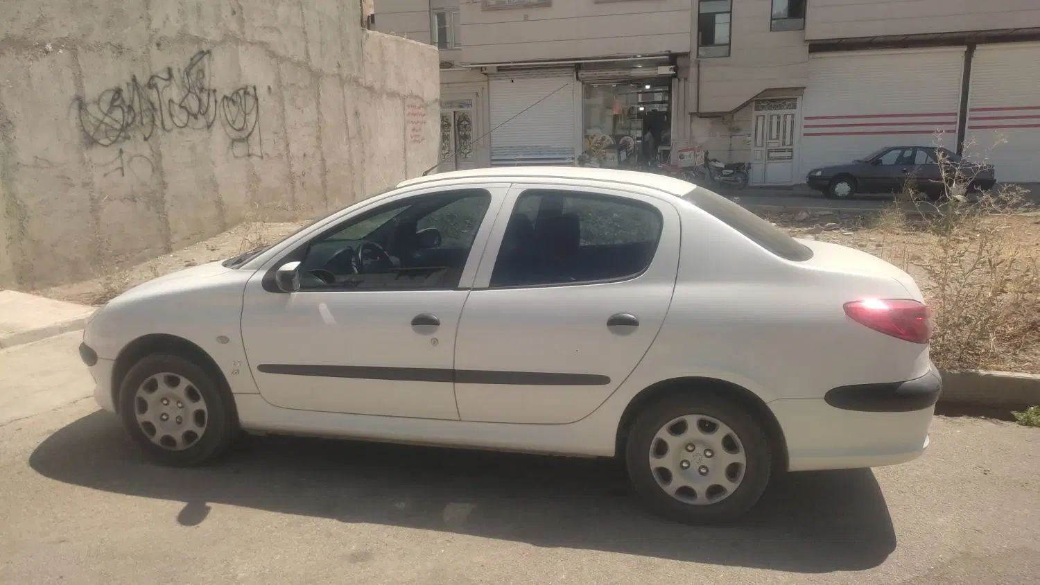 پژو ۲۰۶ صندوق دار v8 - 1396