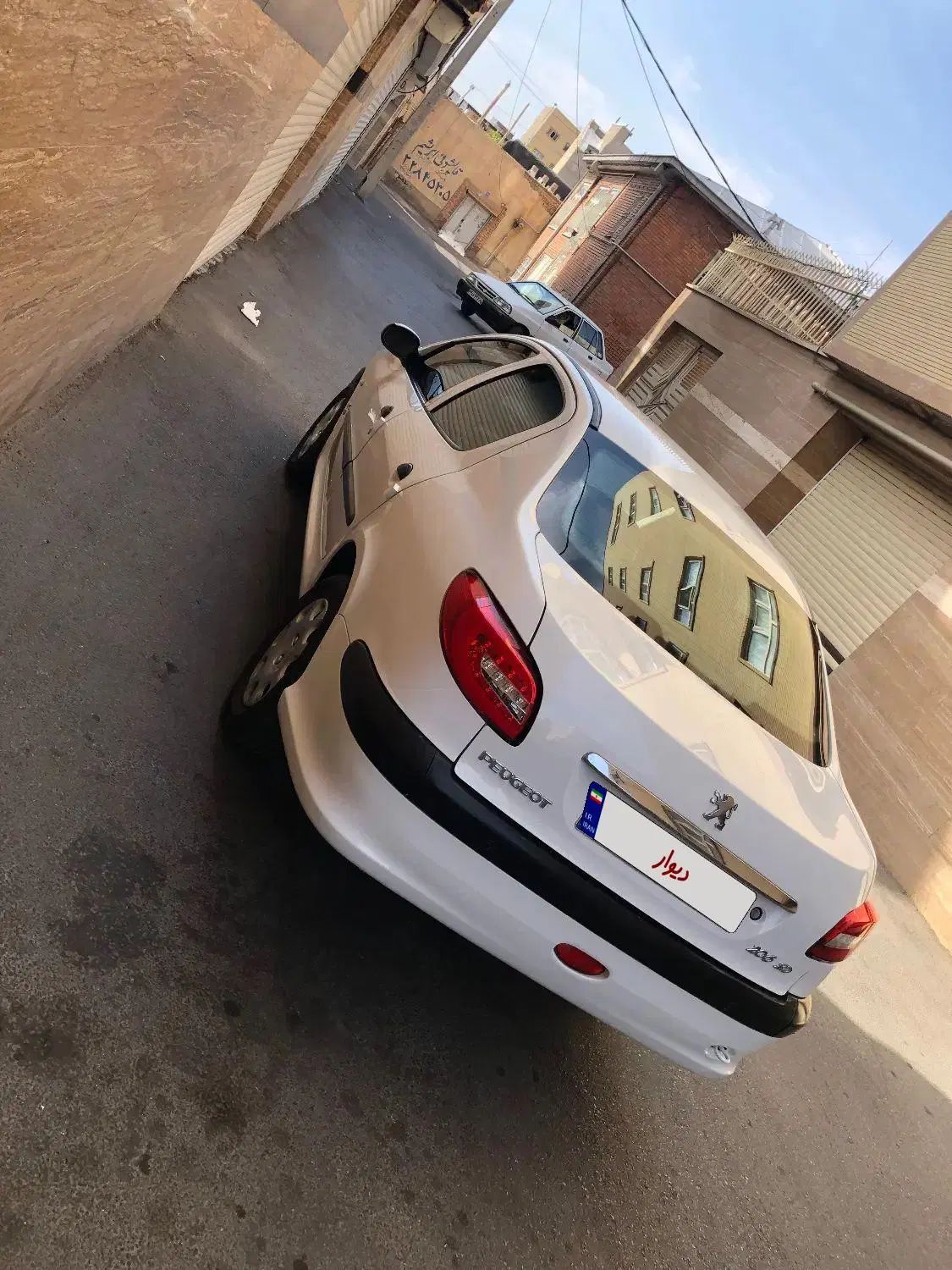 پژو ۲۰۶ صندوق دار v8 - 1395